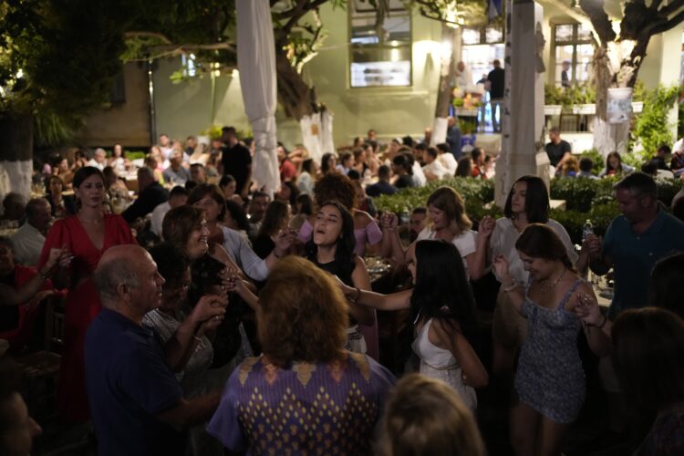Spiritual, material mix at Greek mid-August feast